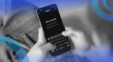 A closeup on a smartphone displaying the ChatGPT interface while someone uses it