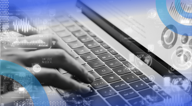 A closeup of hands typing on a keyboard
