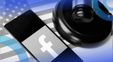 A smartphone with the Facebook logo next to a gavel and an American flag