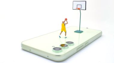 A photo of a miniature basketball player