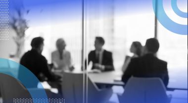 A group of businesspeople in a conference room