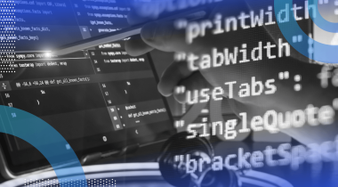 Lines of code overlaid atop an engineer using a stylus on a screen filled with code