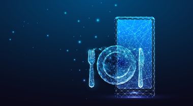 An image of a holographic plate, fork, knife, and tablet to show the idea of restaurant tech.