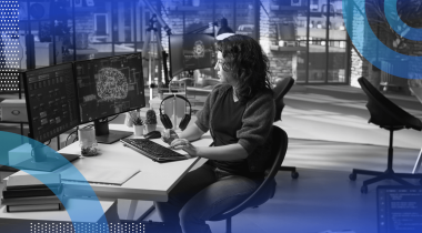 A woman works at a computer terminal