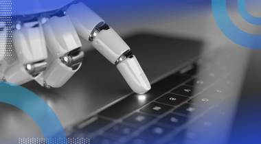 A robotic hand presses a keyboard