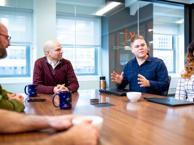 Ryan Lee with coworkers