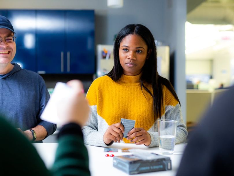 Employee at buildout plays cards