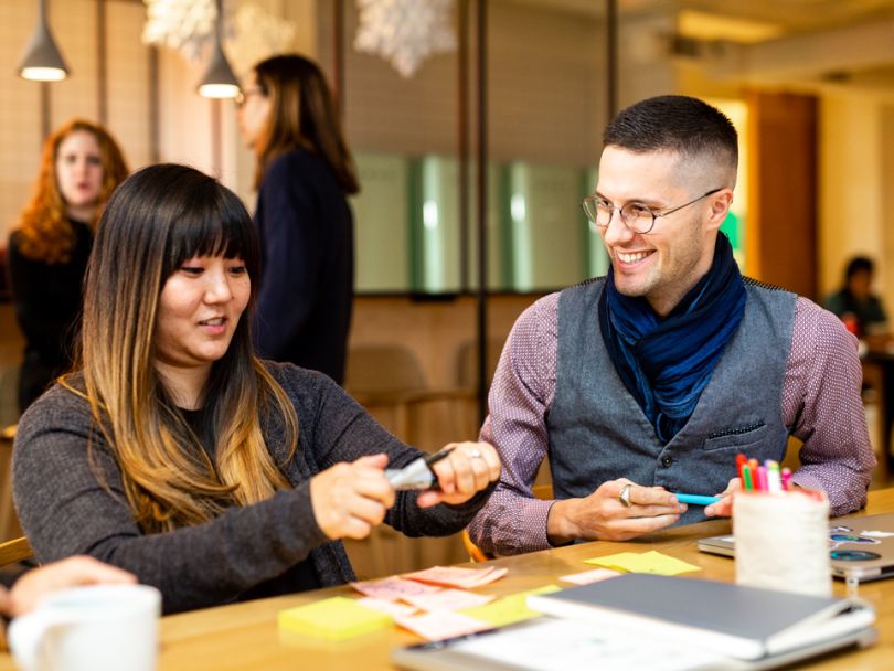 Employees laugh at Arity