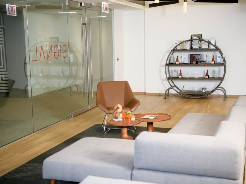 Shelves displaying awards in lobby of Signal's office