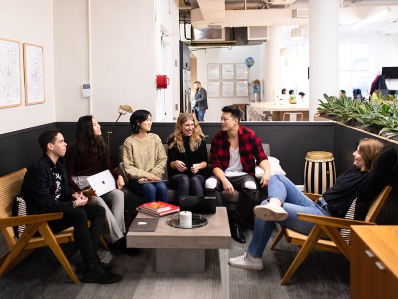 The Ribbon team sitting in the office together.