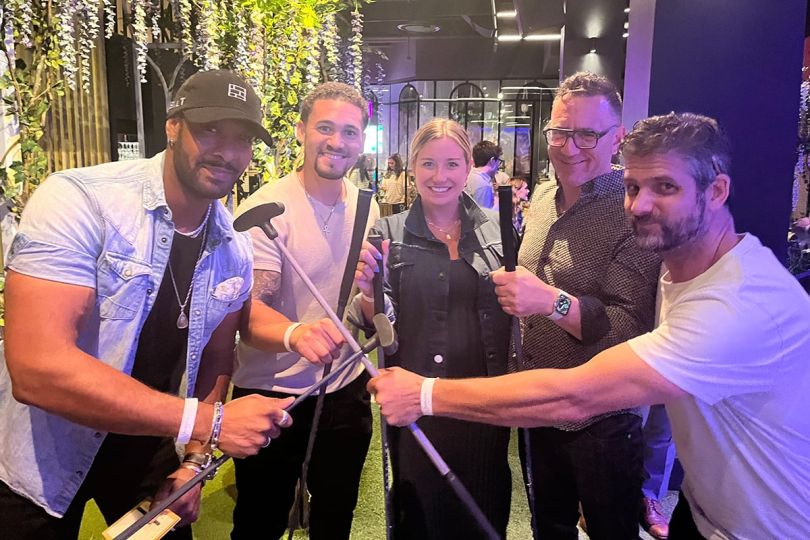 Bilt Rewards team members mini golfing