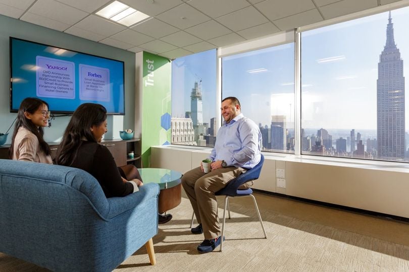Biz2Credit team members in the office