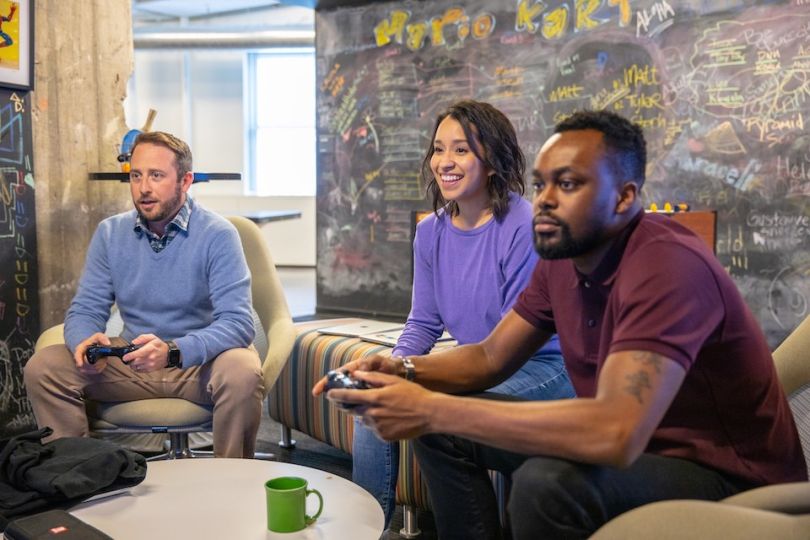 Braintree team member playing PlayStation