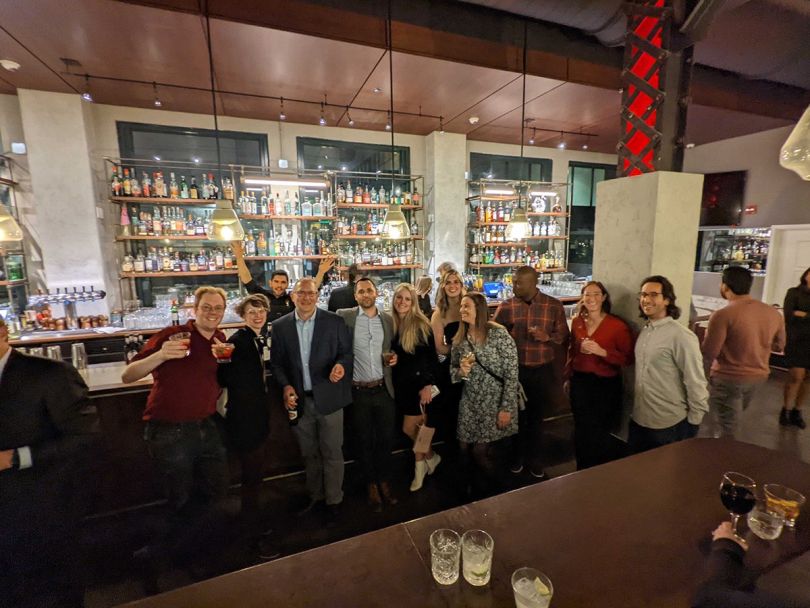 Braviant Holdings team members out at a restaurant for happy hour