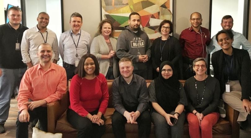 Camelot Global team in group photo