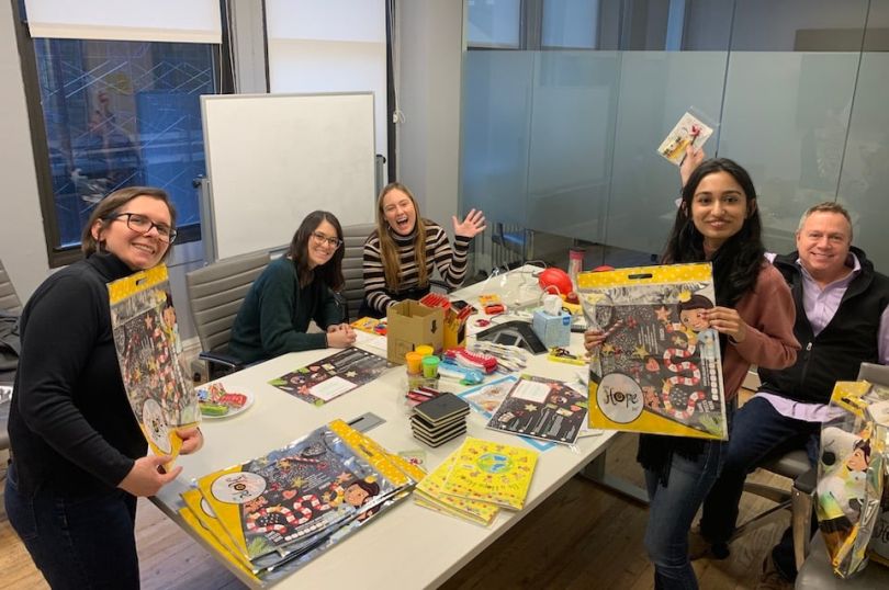 EPAM Systems team doing wrapping gifts