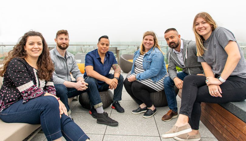Echo Global Logistics team on rooftop patio