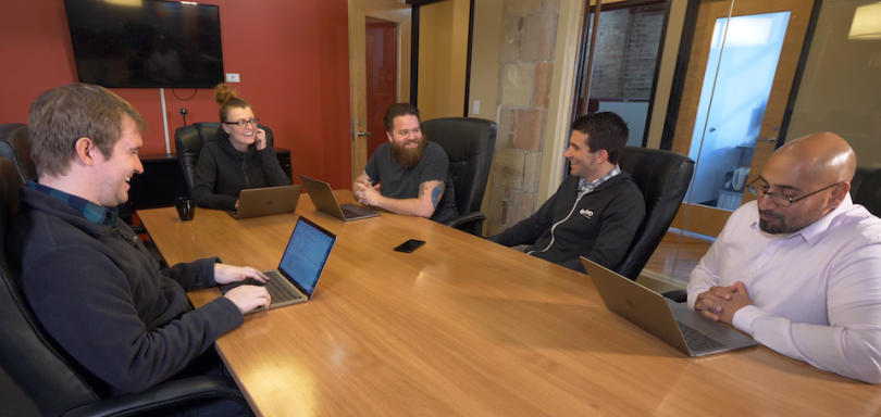 Edovo team working in conference room