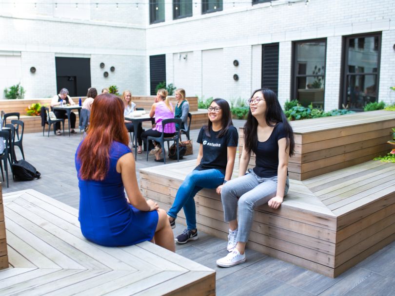 Enfusion staff chatting in outdoor area