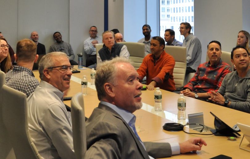 EquiLend team members in a conference room for a meeting