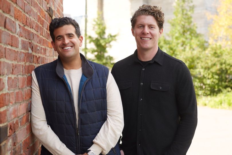 Agentio's co-founders pose together for a photo.