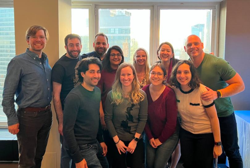The Frame AI team gathers for a photo indoors