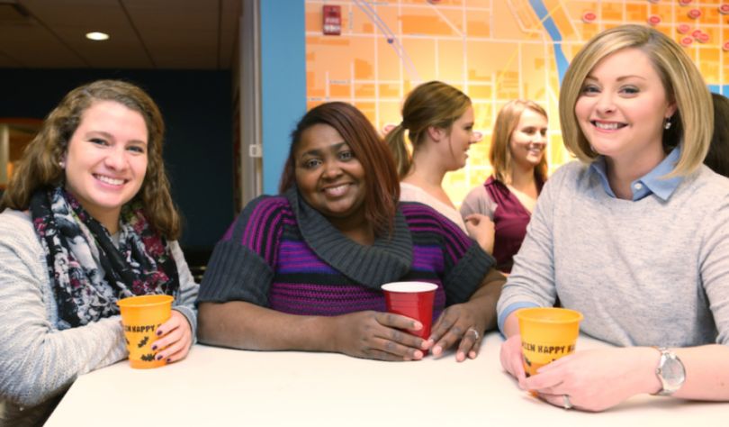 Women at Grubhub pose for a photo