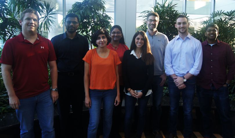 HAVI data team posing in their office
