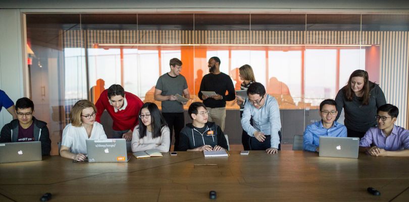 Hudson River Trading team working in large conference room