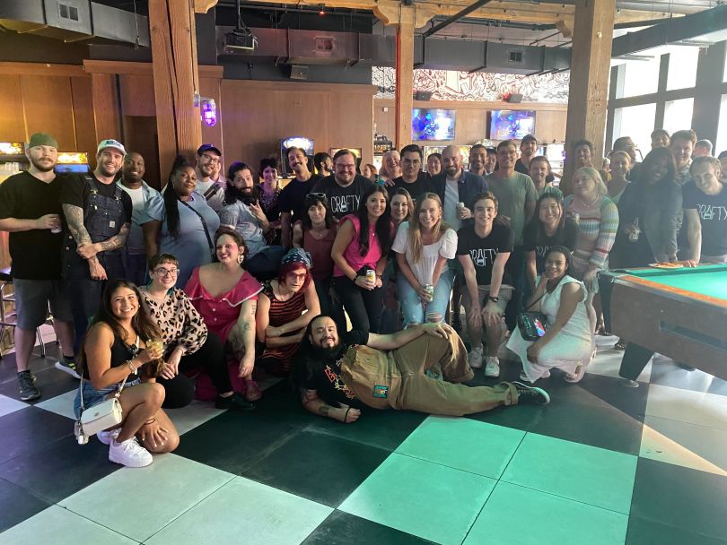Crafty's employees posing for a photo.