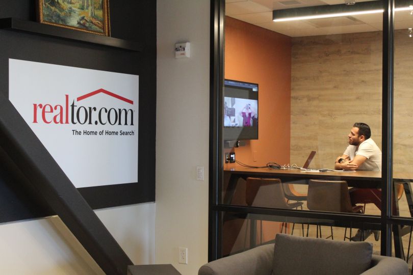 realtor.com employee in conference room