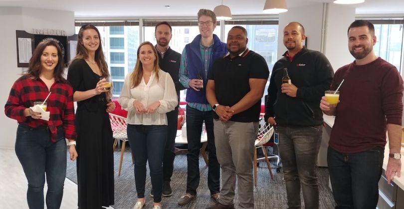 Infutor Data Solutions team in group office photo