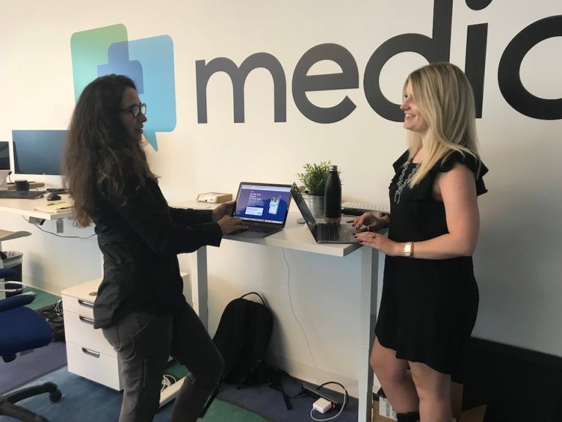 Medici employees chatting