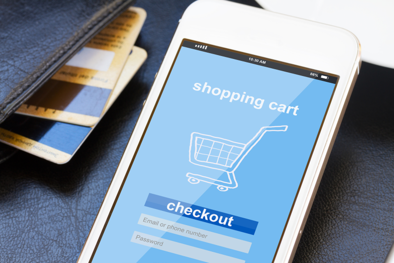 mobile shopping concept - virtual shop on phone screen with credit cards