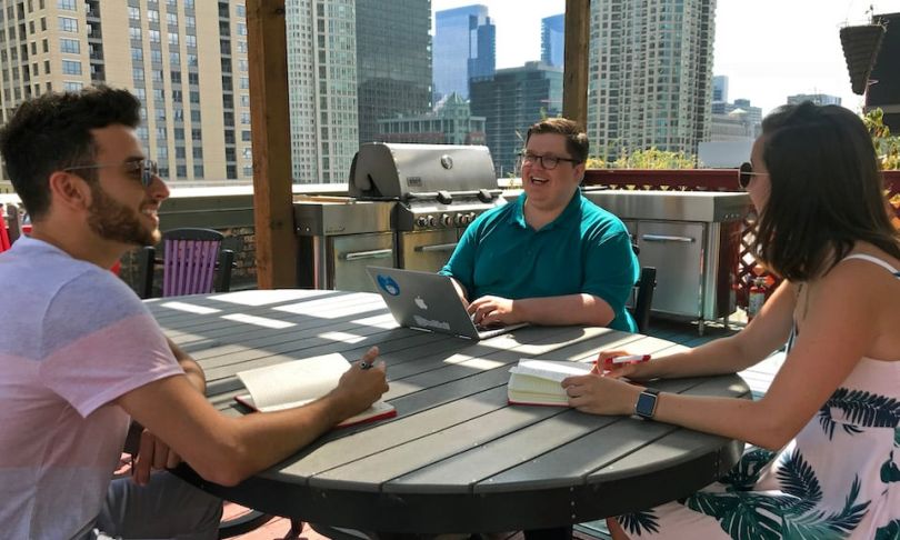 RedShelf team members chatting outdoors