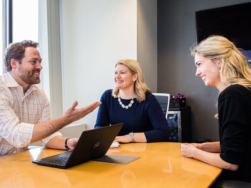 SMS Assist Team Laughing