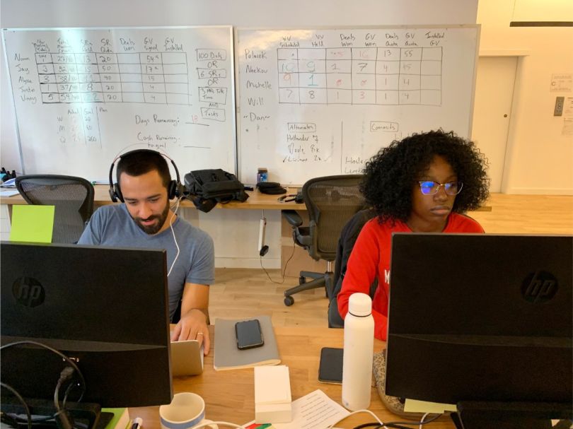 Sealed team members working in the office
