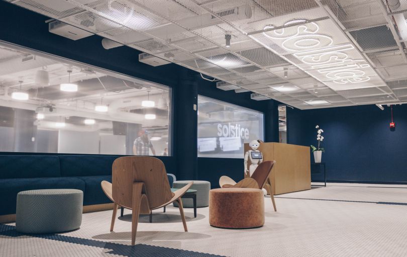 Solstice lobby with robot next to front desk