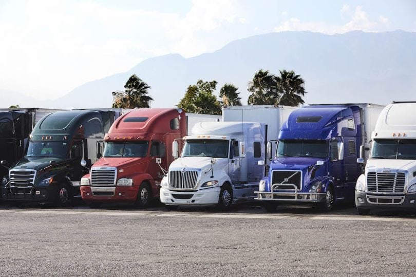 Trucks parked in a parking lot