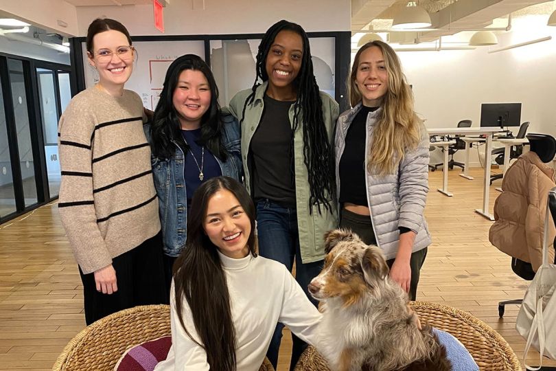 Valon team photo in the office with a dog