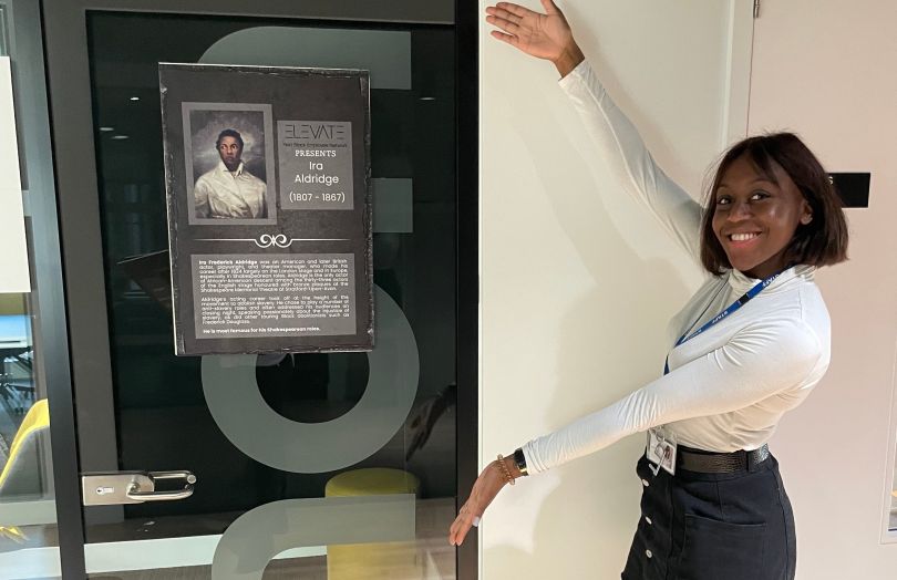 An employee at the Yext office in the U.K. setting up for Black History Month.