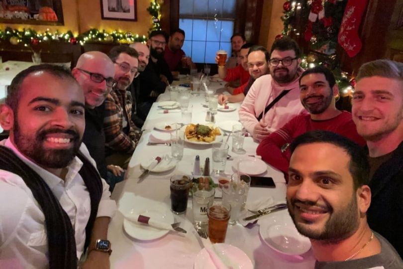 Yieldstreet team members at a restaurant together