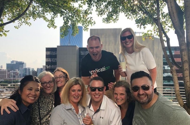 iManage team in group photo outdoors