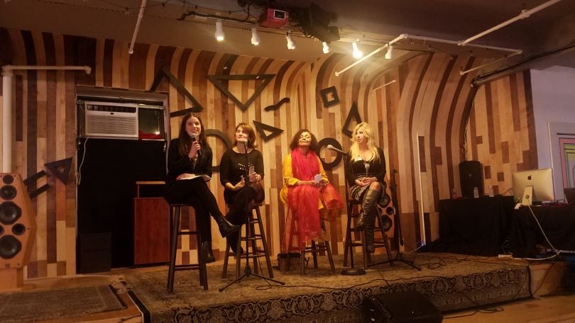 Members of DailyWomen on-stage during an ERG event