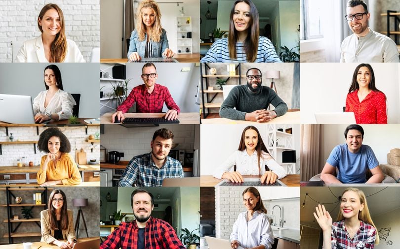 Laptop screen with different headshots of people on a video call