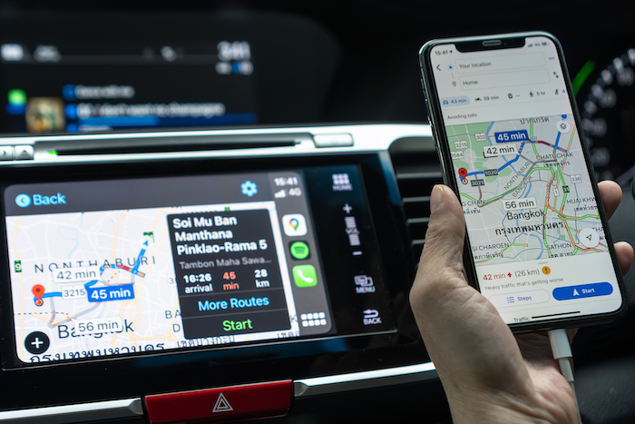 user interface design image of Google Maps user interface on a car console and a smart phone