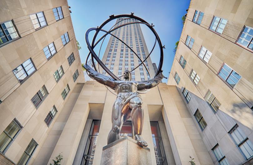 NEW YORK CITY, NY - OCT 30: Atlas statue and Rockefeller Center on October 30, 2014 in New York City. Rockefeller Center is a complex of 19 commercial buildings located in Midtown Manhattan.