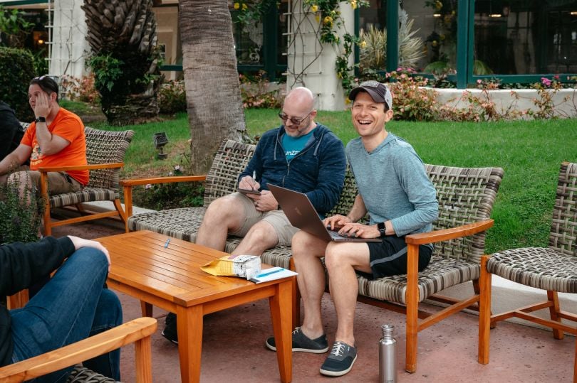 Director of Engineering Dan Kaslovsky meeting with the runZero team outside