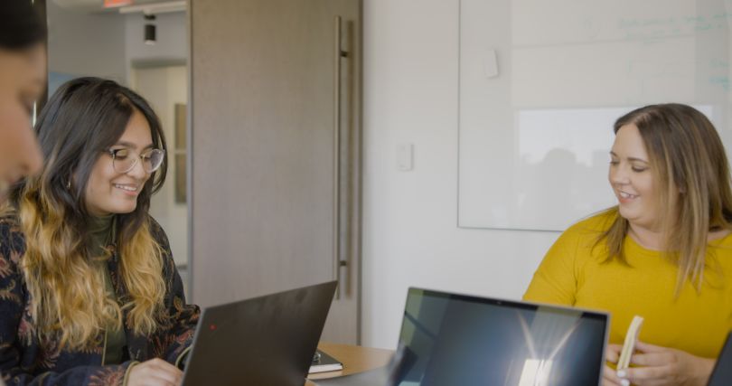 Photo of McKinsey employees in the office.