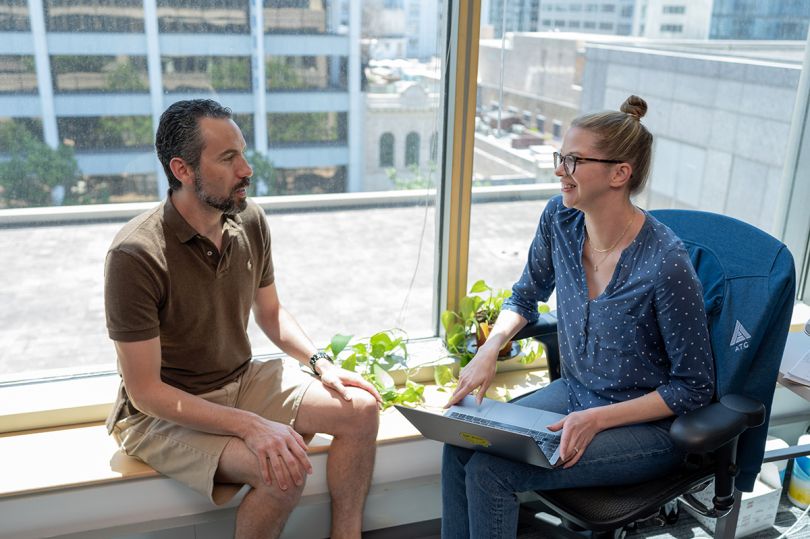 Acrisure team members having a conversation